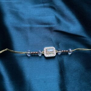 Elegant Crystal-Beaded Rakhi Bracelet - Gold-Plated with Om Motif