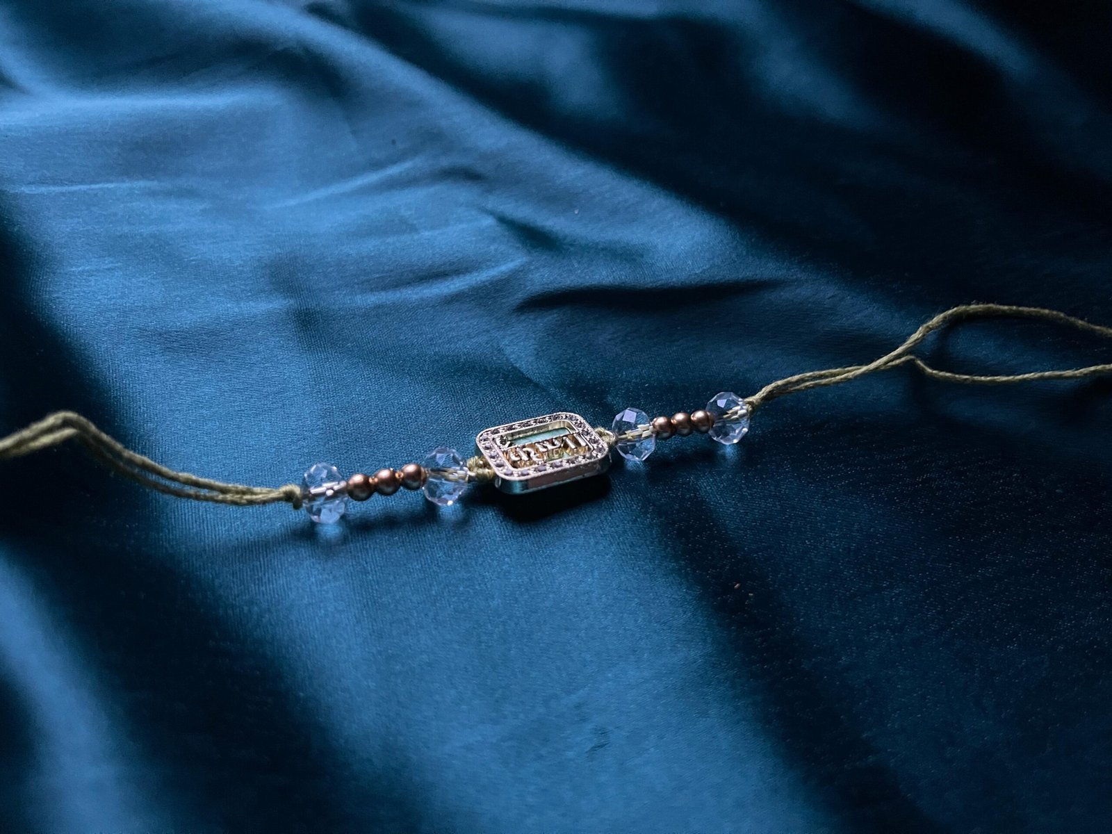 Elegant Crystal-Beaded Rakhi Bracelet - Gold-Plated with Om Motif - Image 5